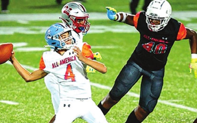 KASE EVANS OF LEXINGTON quarterbacked during the 2022 Under Armour Futures All-American Game in Orlando, Florida, on Jan. 2. He is an eighth-grader. -- Photo courtesy of Under Armour