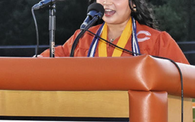 PAULINA HERNANDEZ delivers her valedictorian speech on Friday at the Caldwell High School commencement ceremony.