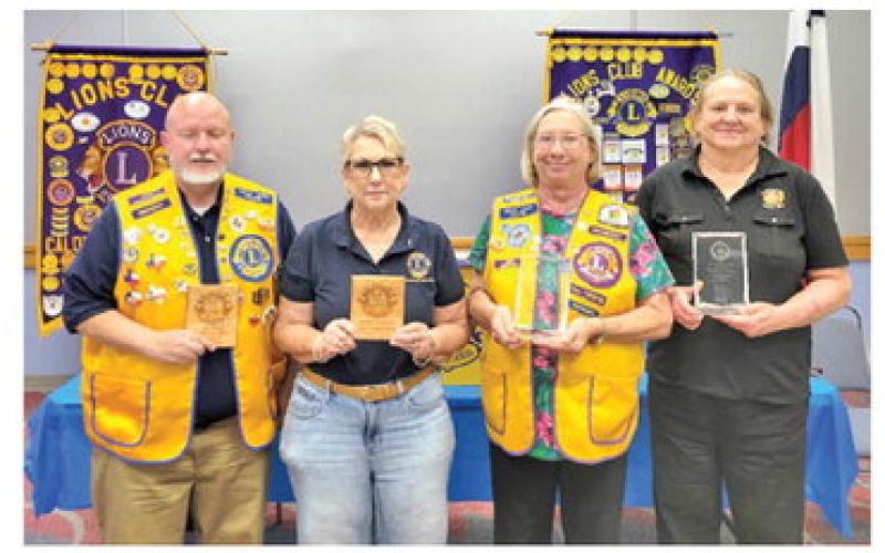 CALDWELL BURLESON COUNTY Lions were recognized and received plaques for outstanding service to the Club: Ken Wiltz, Club President for two years, and Kathy Cornett, Club Events Chair for four years. Also, Jack Wiech awards were presented to Margaret and Bemie Polansky at the Texas Lions Camp. Photo courtesy of Adrien Drouilhet