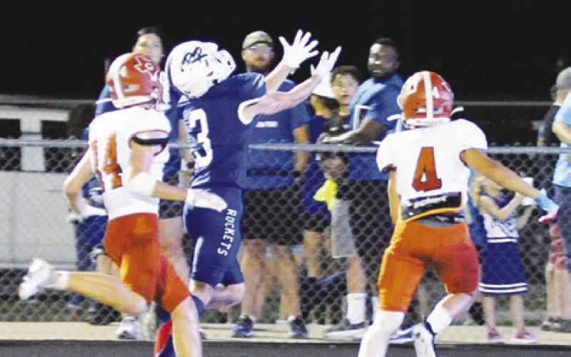 KYLER TOWSLEE AND Korbin Burns cover this Robinson receiver on this pass route. -- Tribune photo by Denise Squier.