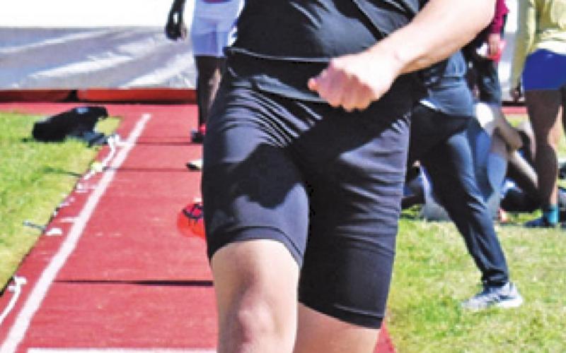 SOMERVILLE’S IAN Teague competes in the long jump at last Thursday’s Happy Skrabanek Relays. --Tribune photo by Roy Sanders