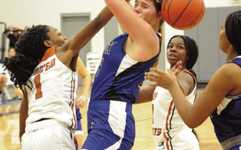 SNOOK’S ALEXIS MACIK IS FOULED during the Snook-Caldwell game on Saturday. -- Tribune photo by Denise Squier