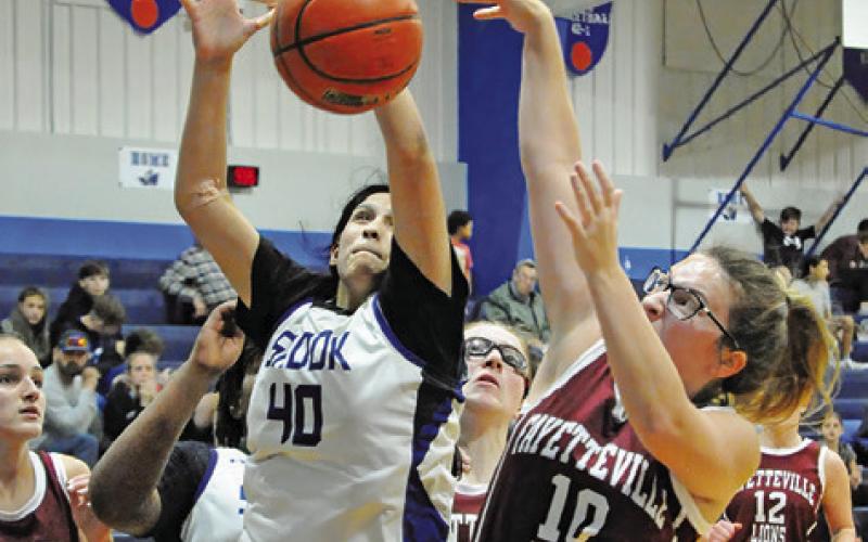SNOOK’S KARLA LARA pulls down a rebound during the Lady Jays’42-31 win over Fayetteville last Tuesday night in Snook.