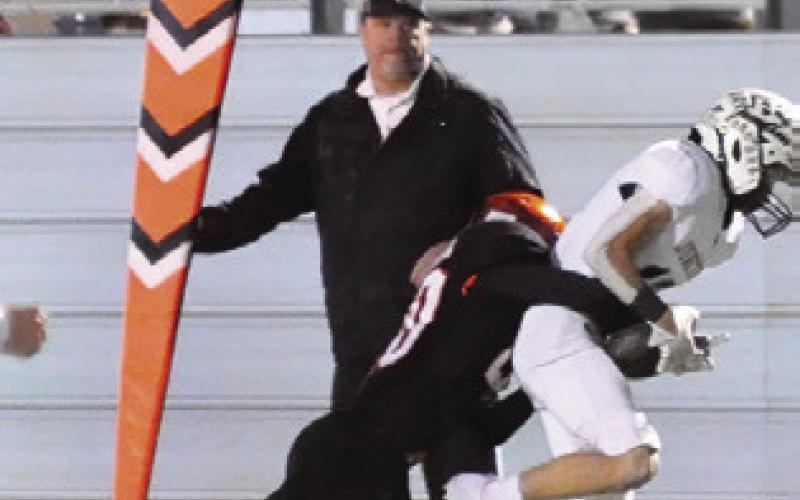 JAYDEN YOUNG OF Somerville makes this tackle against Junction last Friday. Tribune photo by Denise Squier