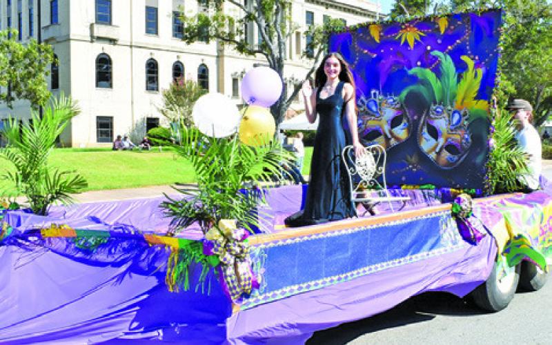 QUEEN CANDIDATE MACELYNN Smith placed second in the Queen’s Category for her Mardi Gras float featuring the fair’s “Let the Good Times Roll” theme in last Saturday’s Burleson County Fair Parade. Tribune photo by Roy Sanders
