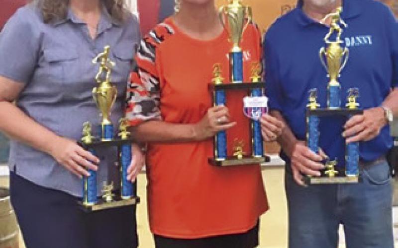CALDWELL’S DORIS HIEDEN placed first in the Class A 30-feet competition at the Danny Patterson Classic Tournament, hosted by the Central Texas Horseshoe Pitchers Waco Club on Saturday, June 10. Hieden is pictured with Danny Patterson, second place, and Polly Murphy, third place.