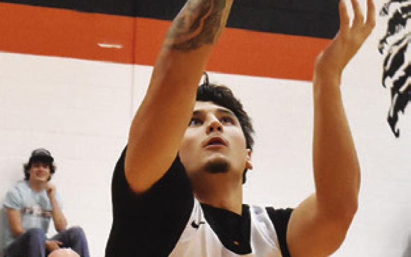 IAN TEAGUE OF Somerville takes a shot against St. Joseph at the tournament. Tribune photo by Roy Sanders