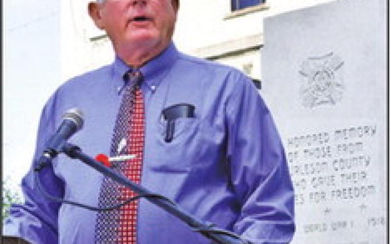 FRANKLIN KARASEK addresses the crowd at theMemorial Dayceremonyat theBurleson County War Memorial at the county courthouse. -- Tribune photo by Roy Sanders