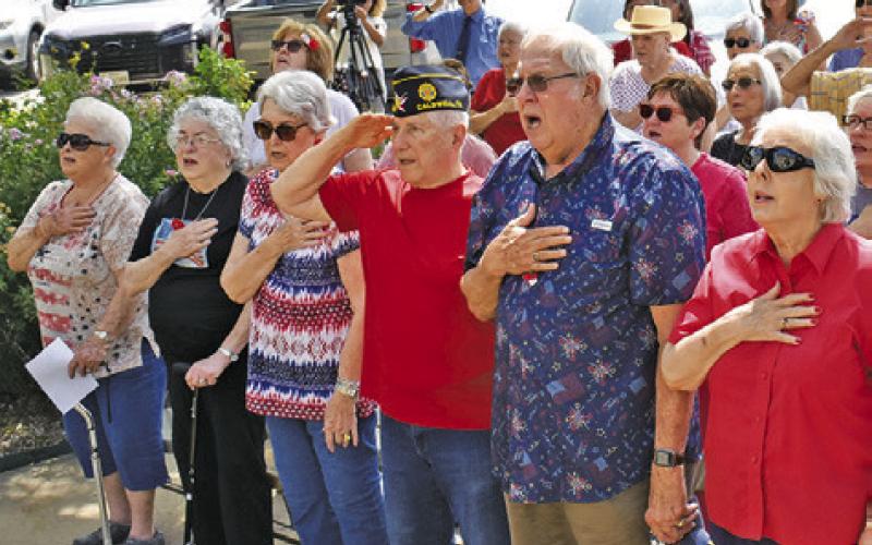 BURLESON COUNTY RESIDENTS attend the Memorial Day ceremony on Monday at the Burleson County War Memorial.