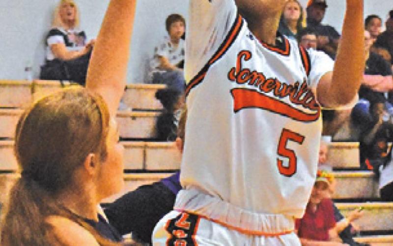 DESTINY VELA SHOOTS the ball for one of her four field goals against Thrall. Vela scored 11 points for the Lady Yeguas in the win.