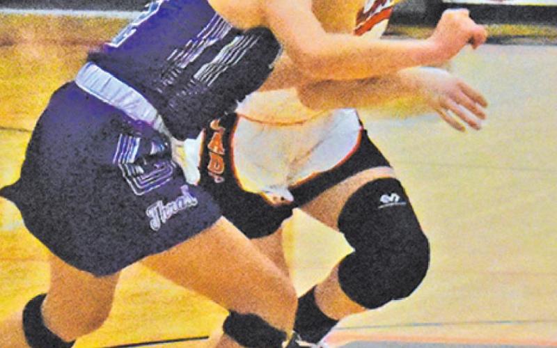 EMMA KOVASOVIC DRIVES the ball down the court during the Somerville-Thrall game last Friday. -- Tribune photo by Roy Sanders