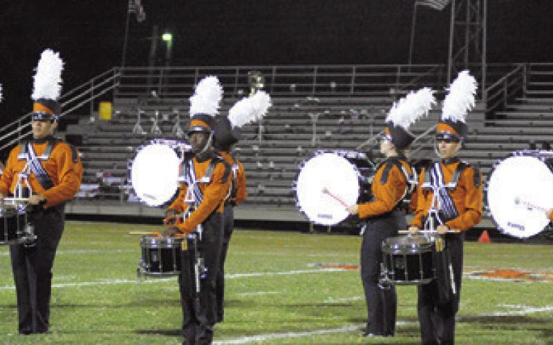 CALDWELL HIGH SCHOOL’S marching band performs at halftime of the Caldwell-Gonzales football game in Gonzales.