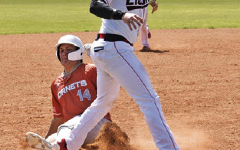 PRESTON SUPAK slides into third base last Friday against Central Texas Christian. Tribune photo by Roy Sanders