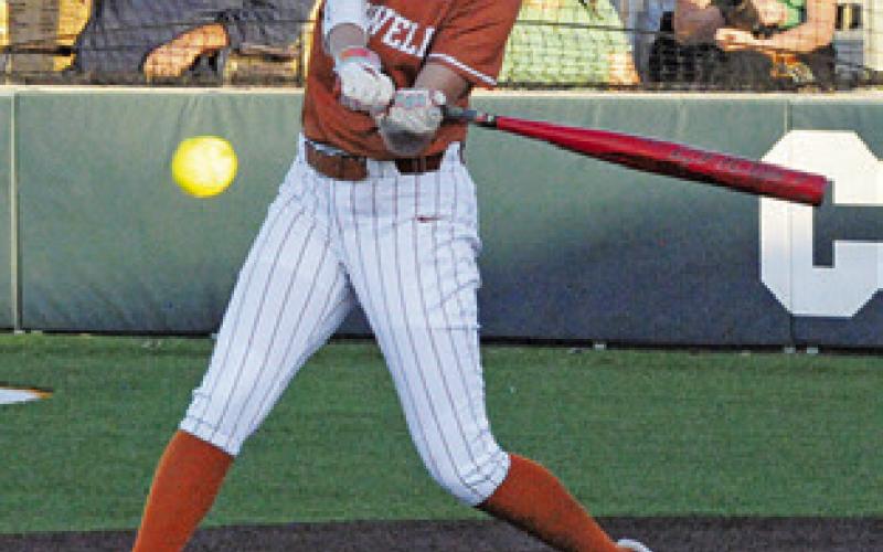 BRYNN MORTON prepares to swing at the ball during the Caldwell-Bellville game. Tribune photo by Denise Squier