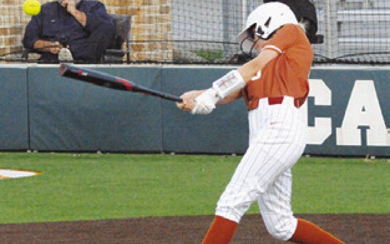 EMMA GREGORY fouls the ball off the bat during the Caldwell-Bellville game last week. Tribune photo by Denise Squier