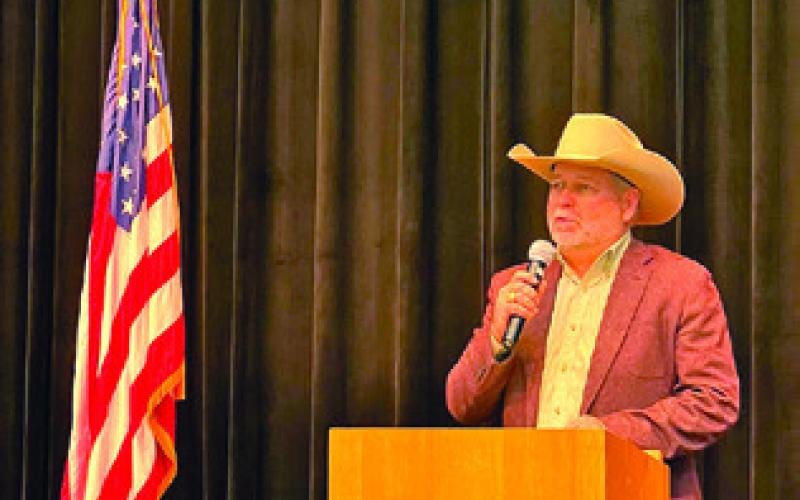 COUNTY JUDGE KEITH SCHROEDER addresses the crowd at the Republican Party candidate meet and greet at the Caldwell Civic Center. Tribune photo by Sabine Lazo
