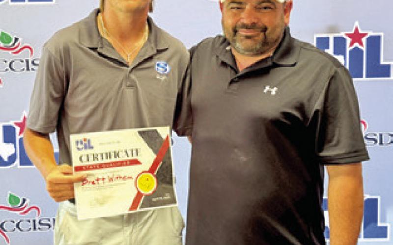 BRETT WITHEM and Coach Christopher Horn are pictured at the regional tournament. Withem advanced to the state tournament.