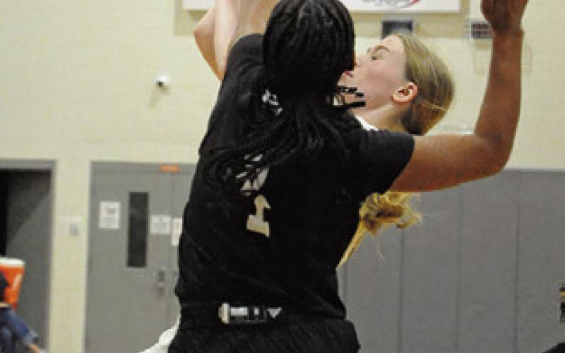 IRELAND MORGAN is fouled during Caldwell’s 44-31 win over Hearne on Tuesday. Tribune photo by Denise Squier
