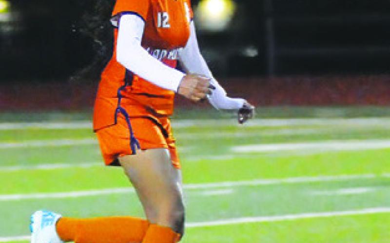 HEER PATEL dribbles the ball down the field during the Caldwell-Florence game on Friday. Tribune photo by Denise Squier