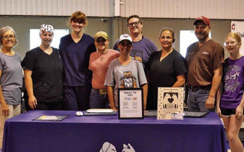 PROJECT SNIP VOLUNTEERS and veterinary staff worked together to spay/neuter 54 cats at the Monday, Aug. 4 TNR clinic. Tribune photo by Sabine Lazo
