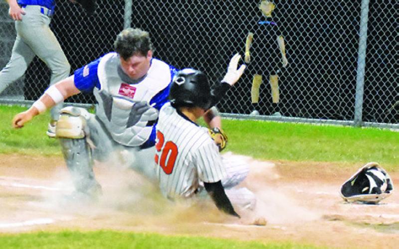 AXEL NOYOLA OF Somerville slides into home against Frassati Catholic in their Friday game at the Somerville Classic Tourney. Tribune photo by Roy Sanders