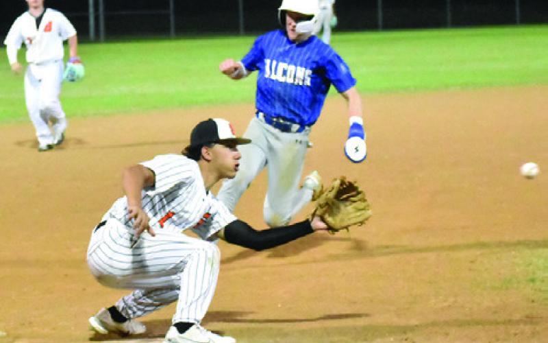 SOMERVILLE THIRD BASEMAN Greg Fowler gets ready for this catch and to tag a Frassati Catholic School base runner. Tribune photo by Roy Sanders