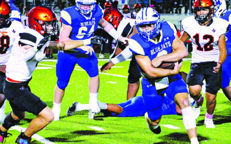 SNOOK’S JORDAN PRICE carries the ball against Somerville.