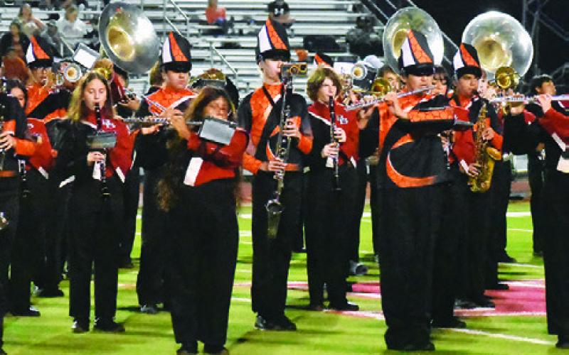 THE COMBINED CALDWELL and Bellville High School Bands perform at halftime of the Caldwell-Bellville football game.