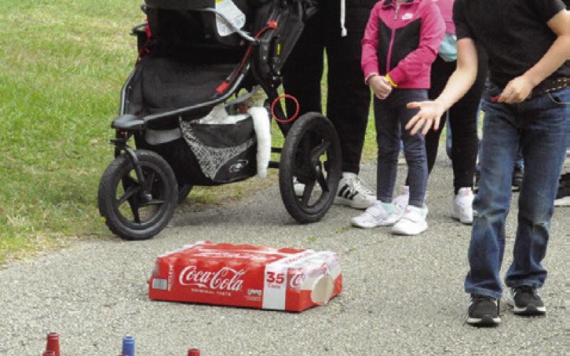 RINGING SODAS AND WINNING SODAS were part of Saturday’s picnic in the part and Easter egg hunt event. Tribune photo by Denise Squier