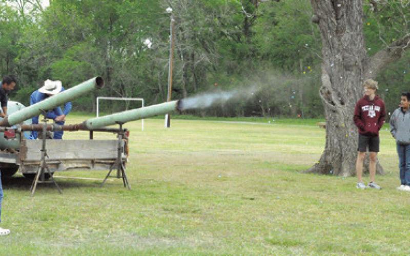 A CANNON SHOOTING EASTER EGGS was a highlight of Saturday’s picnic in the park and Easter egg hunt hosted by First Baptist Church of Caldwell. Tribune photo by Denise Squier