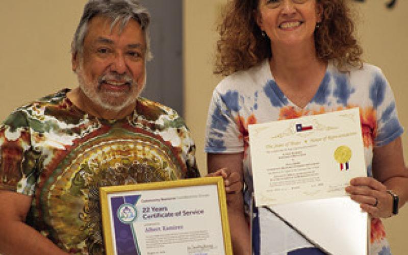 ALBERT RAMIREZ IS HONORED with a flag that flew over the state capitol in his honor at his retirement celebration on Thursday, Aug. 27. Tribune photo by Sabine Lazo