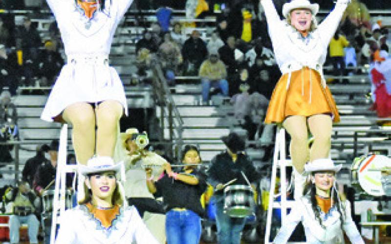 THE CALDWELL HIGH School Honeybees dance team performs at halftime of the Caldwell-Sealy football game last Friday.