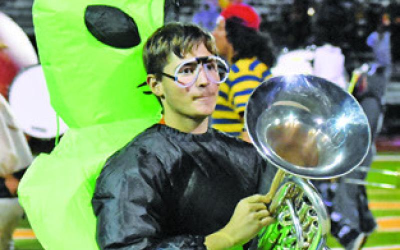 GRANT LEUBNER performs for the Caldwell High School Marching Band on Friday, Oct. 31, at Hornet Stadium in Caldwell.