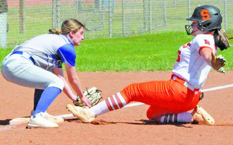 SOMERVILLE’S AVERIE HERNANDEZ slides into third during the Somerville-Snook game last Tuesday afternoon in Somerville. Tribune photo by Denise Squier