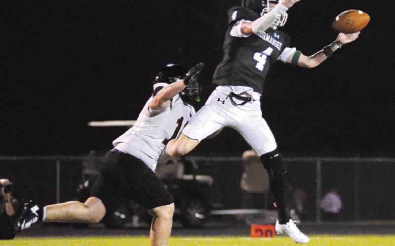 SOMERVILLE’S LUKE MOSES moves in for a tackle as this Normangee receiver lunges for the football. Tribune photo by Denise Squier