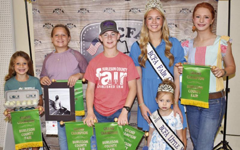 CAYLE CANON WON grand champion in senior horticulture, Kes Canon in intermediate acrylic and horticulture, Blakely Kemper for a picture and Hayden Kemper for horticulture, eggs. Joining them are Fair Queen Hadleigh Novosad and Little Miss Avery Grace Freeman.