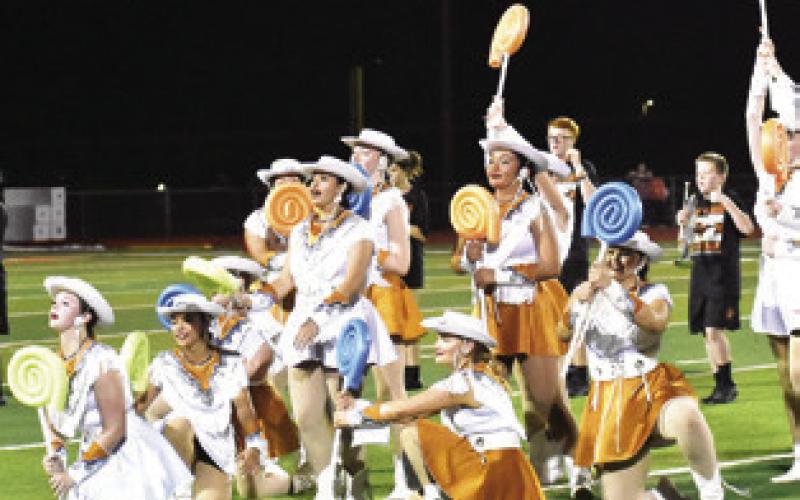 THE CALDWELL HIGH SCHOOL Honeybees join the band for this halftime performance.