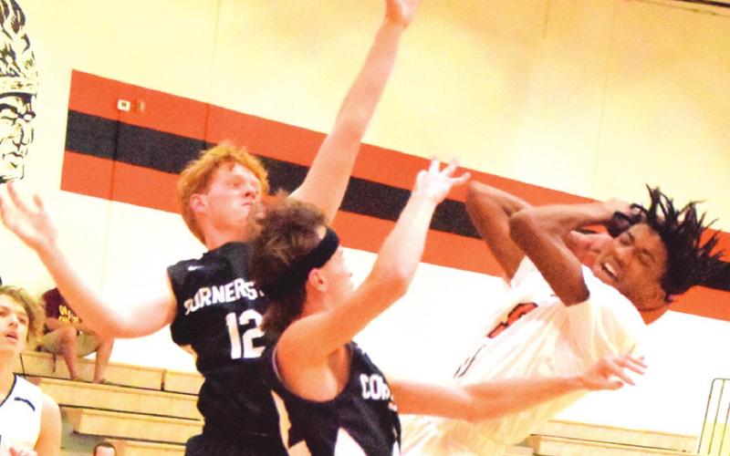 SOMERVILLE’S BRANDYN CARTER takes a shot against Cornerstone Academy. -- Tribune photo by Denise Squier