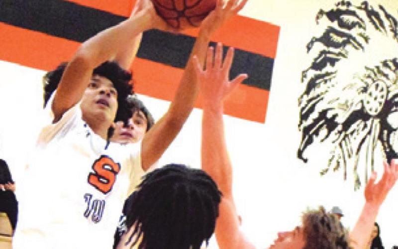 GARDNER SHIVERS of Somerville takes a shot against Cornerstone Academy.