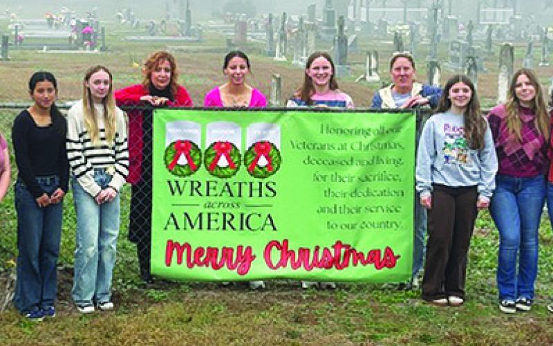CALDWELL HIGH SCHOOL’S Young Republicans placed wreaths on graves of veterans at the Holy Rosary Cemetery. Pictured, from left, are Bree Martin, Gabby Quintero, Emrie Splawn, Nevonne Sempe, Kamryn Gomez, Chloe Sams, Terri Armstrong (club sponsor), Million Dowell, Sarah Boniol and Angelika Hil.