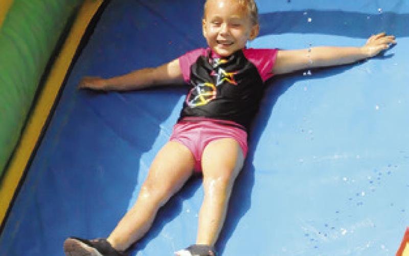 CHILDREN WERE ALL smiles at last Thursday’s Special Event Thursday, hosted by the Harrie P. Woodson Memorial Library. Tribune photo by Denise Squier