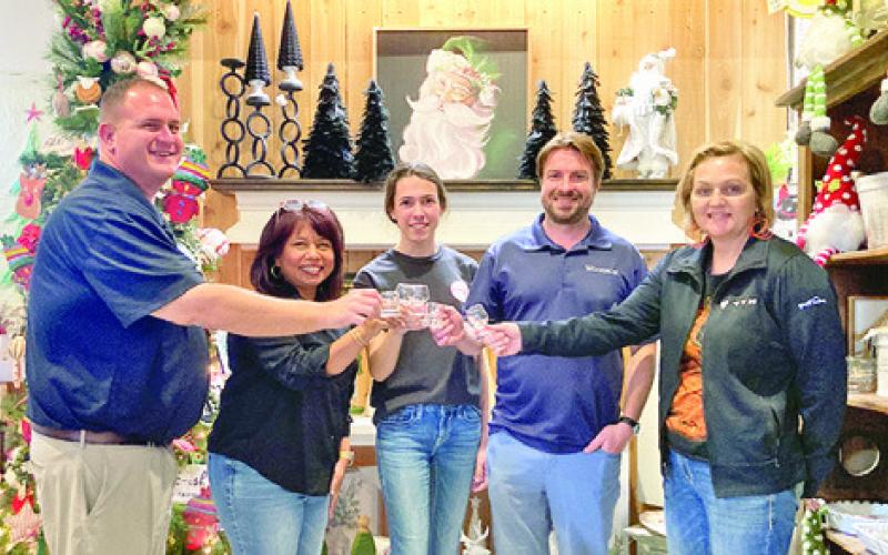 MEMBERS OF THE CHAMBER in 2024, just before the November “Toasting in the ‘Well” event. Pictured, from left, are Brian Broaddus, Susan Mott, Kaylee Odstrcil, Stu Chapman and Sharon Livengood.