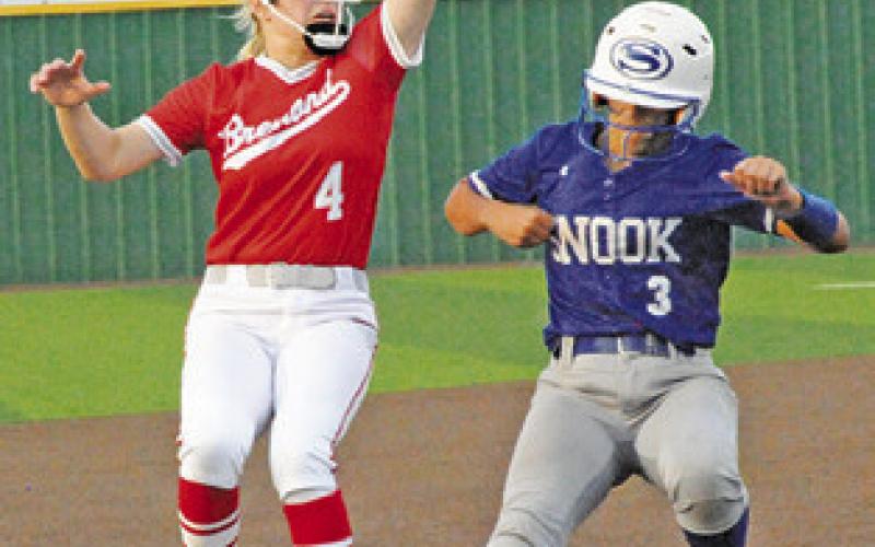 MARISSA BATISTE makes it safely to third during the Snook-Bremond area game last Thursday at Navasota. -- Tribune photo by Denise Squier