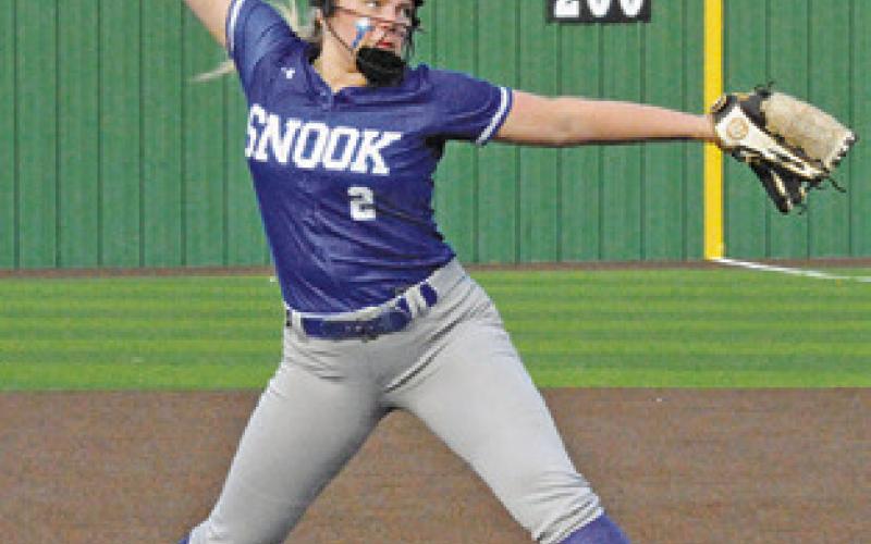 AUBREY BECKER pitches during the Snook-Bremond area game last Thursday in Navasota.