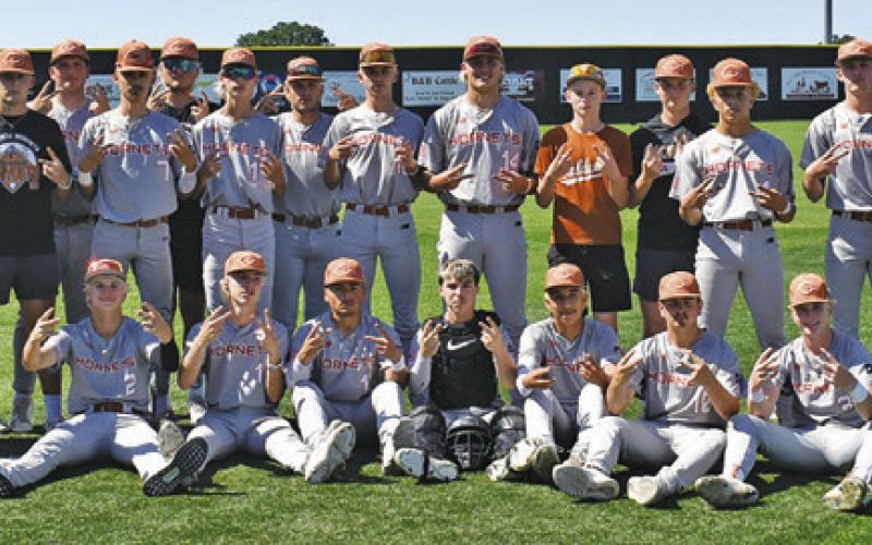 THE CALDWELL HORNETS CELEBRATE a pair of 10-0 bi-district wins over Brookshire Royal on Saturday.
