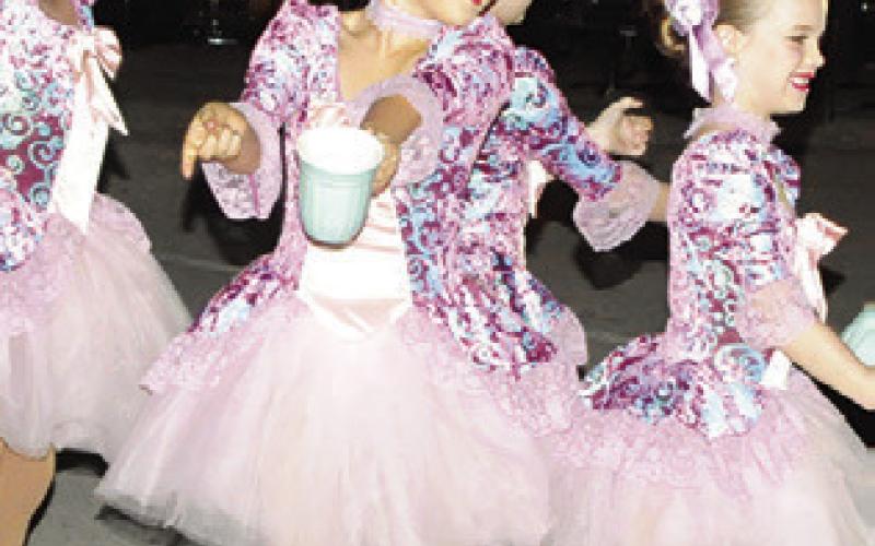 THESE DANCERS offered up a dance about hot chocolate at “Christmas on the Square.” Tribune photo by Denise Squier