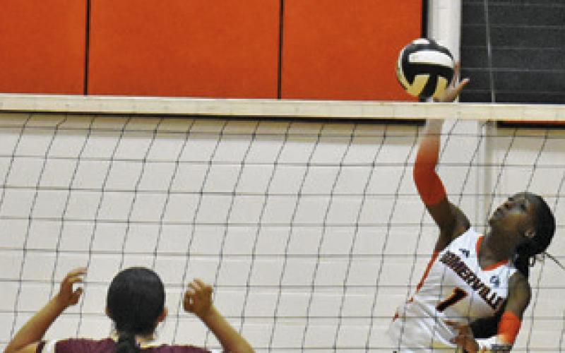 SOMERVILLE’S JANAYA ISOM hits the ball over Milano players during the Lady Yeguas’ win last Friday.