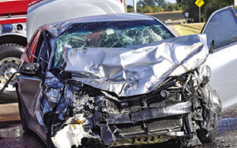 THIS HELICOPTER TRANSPORTS a patient from the scene of this accident on Saturday, Oct. 18, on State Highway 21 at F.M. 50. No details on the accident were available at press time. THIS CAR WAS damaged on Saturday, Oct. 18, in an accident on State Highway 21 and F.M. 50. No information on the accident was available at press time.