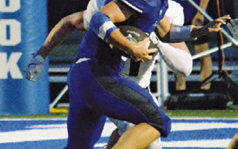 SNOOK’S OFFENSE gets going against NBCA last Friday. Tribune photo by Kim Hutcheson