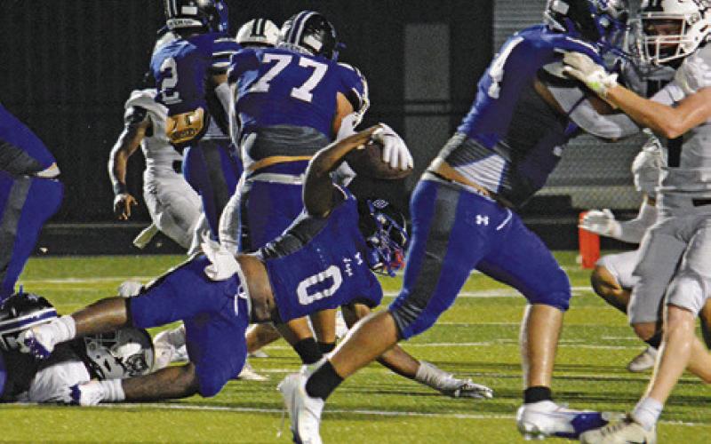 SNOOK’S OFFENSE MOVES the ball against NBCA last Friday in the opener in Snook. Tribune photo by Kim Hutcheson